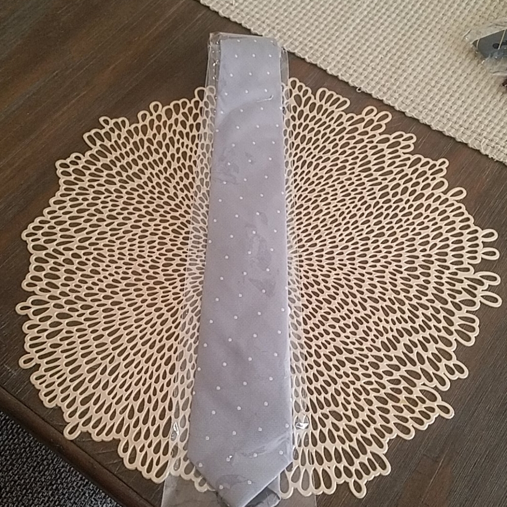 Grey tie with light grey polka dots